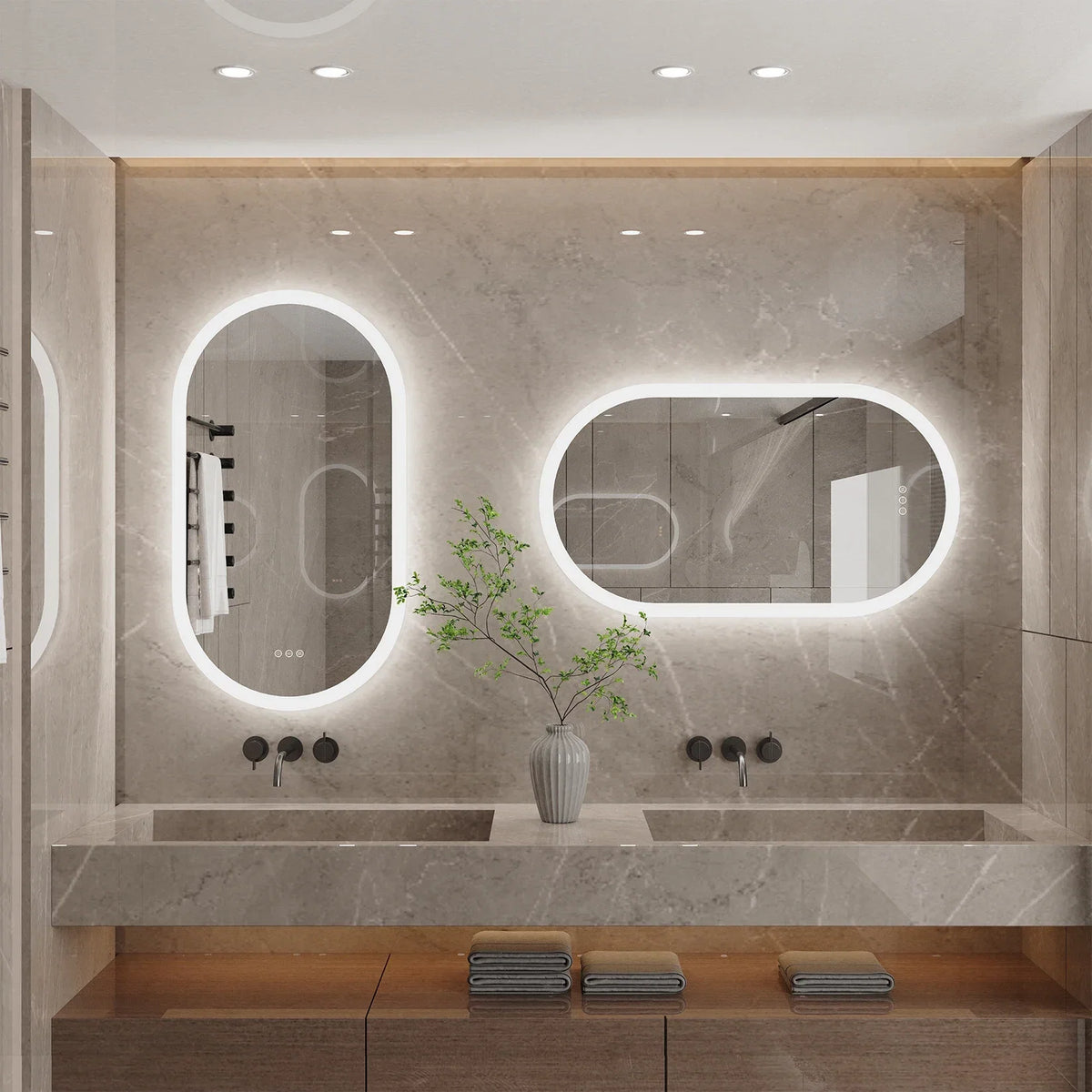 Oval backlit LED bathroom mirror on a neutral wall