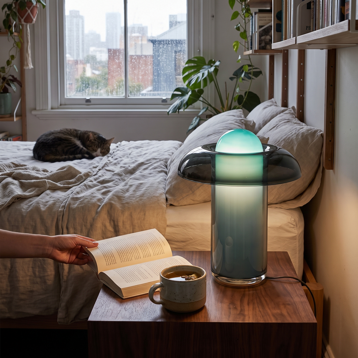 Artistic glass table lamp in a lifestyle setting