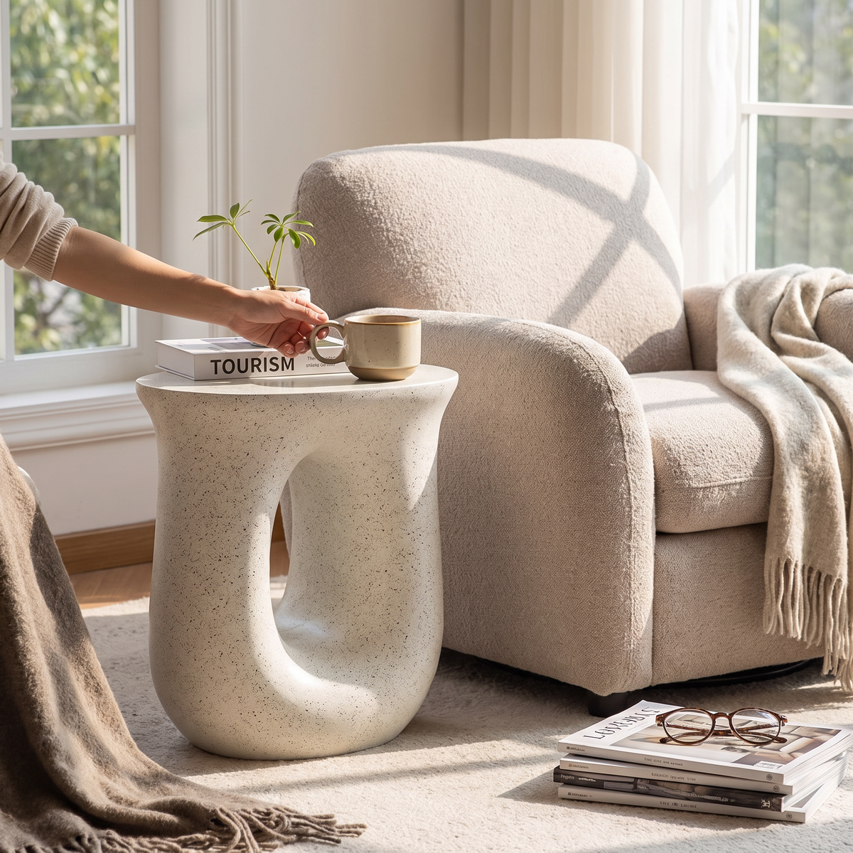 Cream marble side table in a lifestyle setting