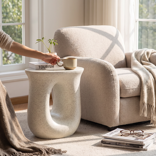Cream marble side table in a lifestyle setting