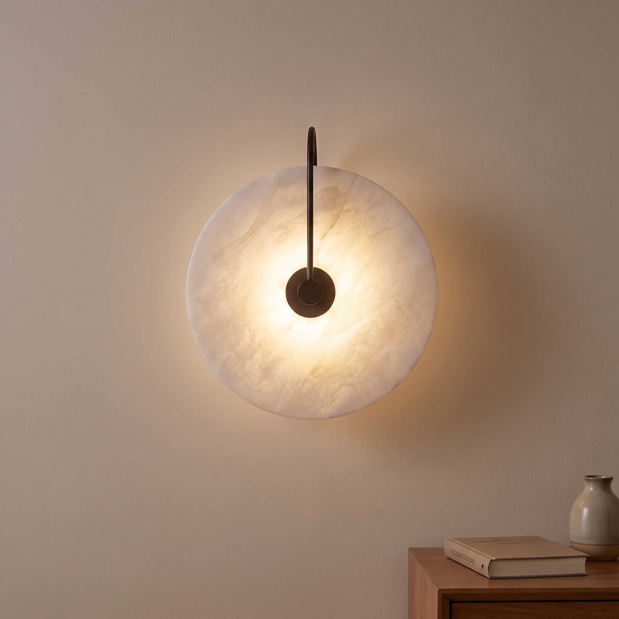 Marble LED wall light glowing warm in a bedroom