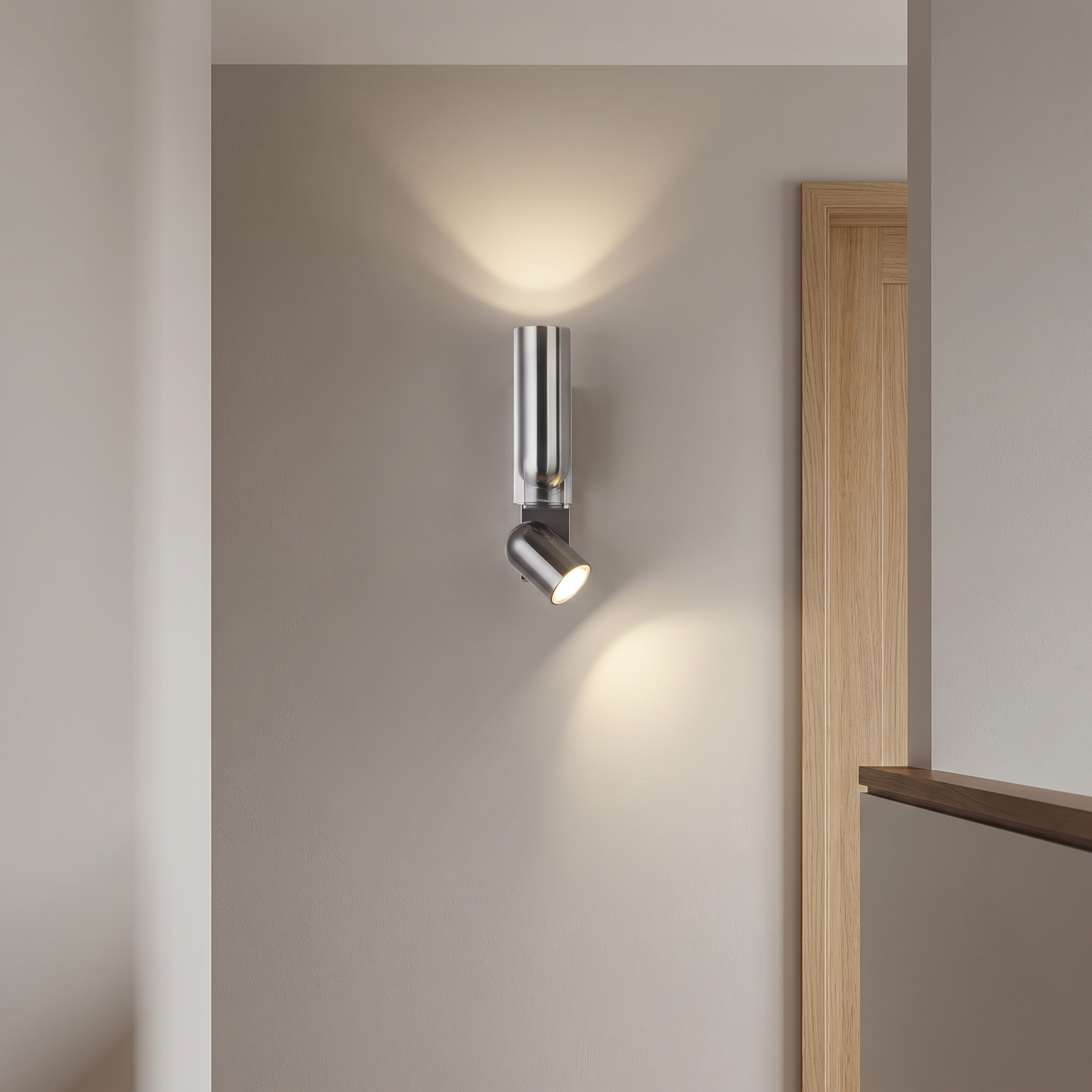 Slim stainless steel wall light beside a doorway